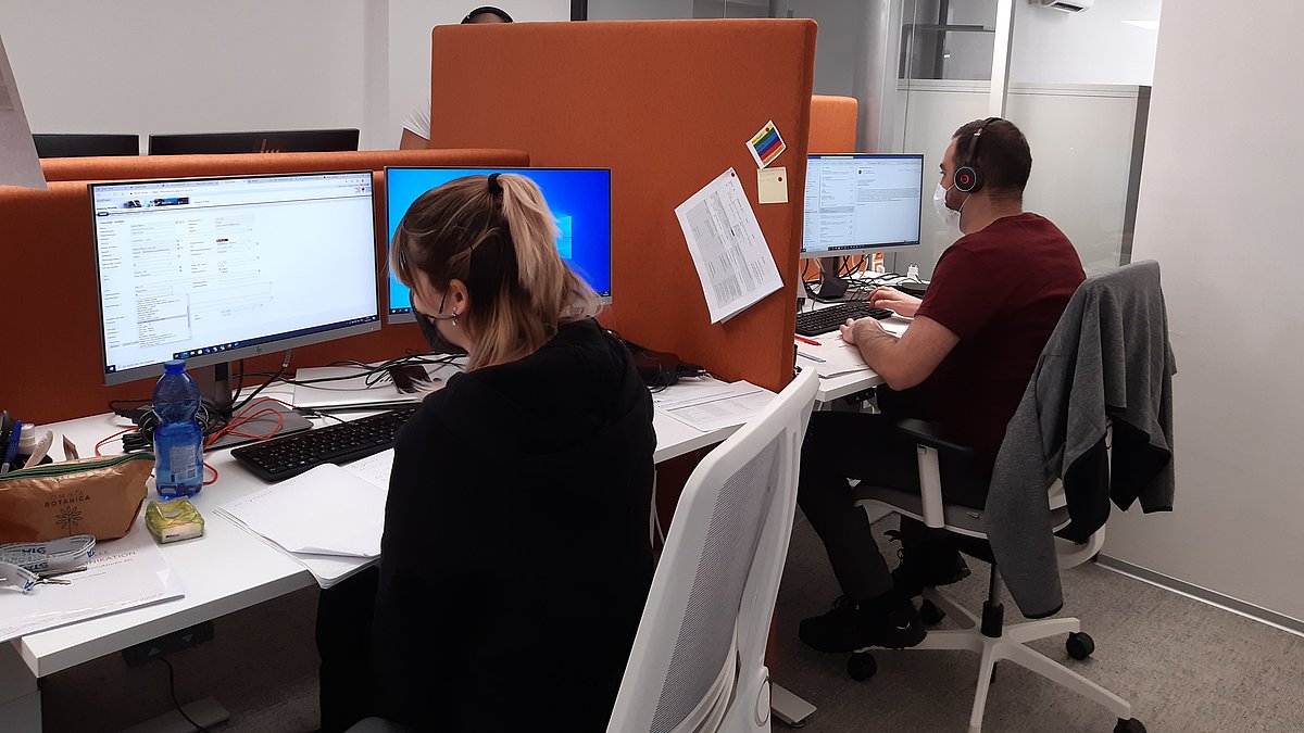 People working at the service and information center